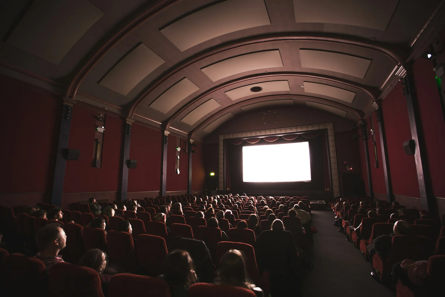 An audience seated in a traditional cinema